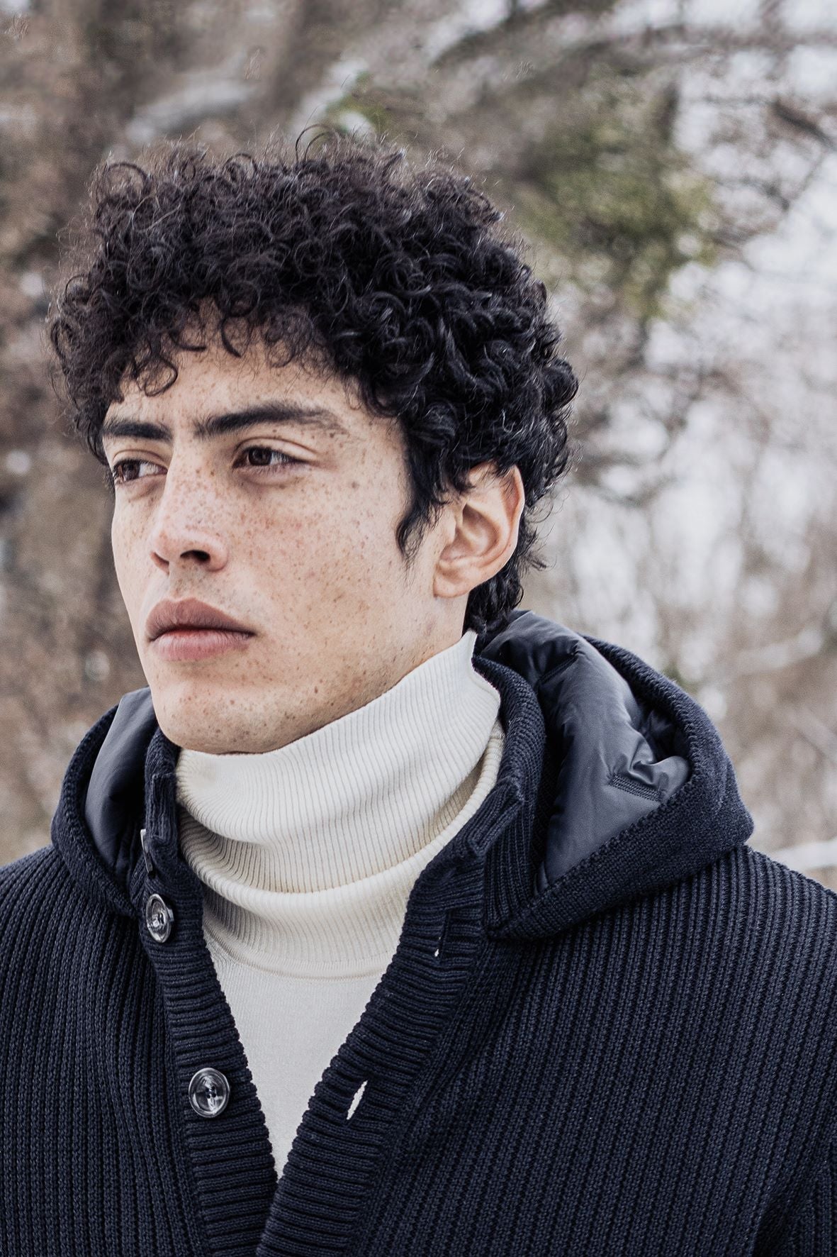 Hooded cardigan made of merino wool and quilted lining