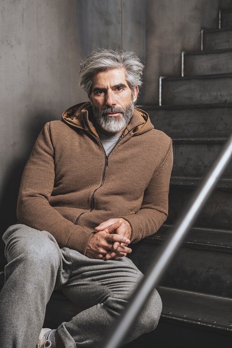 Outdoor jacket in rice grain knit structure made of 100% Merino, fully lined with nylon quilting